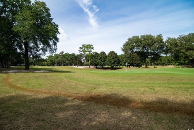 Second story end unit with sweeping views of Pawleys Plantation on  in South Carolina - for sale on GolfHomes.com, golf home, golf lot