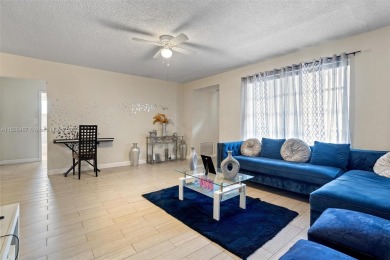 Charming 3 bedrooms /2 bathrooms Home in Sunrise Golf Village on Sunrise Country Club in Florida - for sale on GolfHomes.com, golf home, golf lot