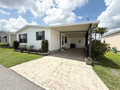 PRICED TO SELL!!! This 2-bedroom, 2 full bath home needs someone on Grasslands Golf and Country Club in Florida - for sale on GolfHomes.com, golf home, golf lot