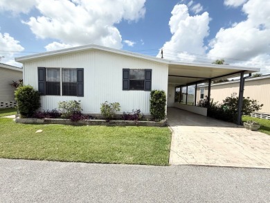 PRICED TO SELL!!! This 2-bedroom, 2 full bath home needs someone on Grasslands Golf and Country Club in Florida - for sale on GolfHomes.com, golf home, golf lot