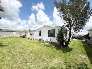 PRICED TO SELL!!! This 2-bedroom, 2 full bath home needs someone on Grasslands Golf and Country Club in Florida - for sale on GolfHomes.com, golf home, golf lot