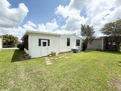PRICED TO SELL!!! This 2-bedroom, 2 full bath home needs someone on Grasslands Golf and Country Club in Florida - for sale on GolfHomes.com, golf home, golf lot
