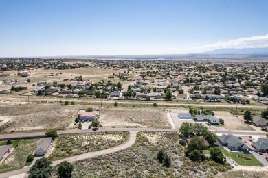This 1-acre vacant lot, right off McCulloch Blvd in Pueblo West on Desert Hawk At Pueblo West in Colorado - for sale on GolfHomes.com, golf home, golf lot