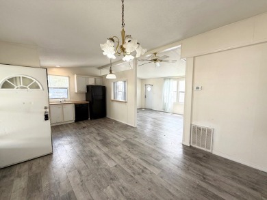 PRICED TO SELL!!! This 2-bedroom, 2 full bath home needs someone on Grasslands Golf and Country Club in Florida - for sale on GolfHomes.com, golf home, golf lot