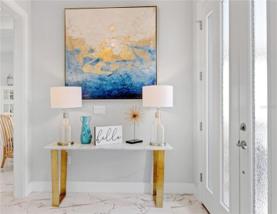 The ultimate saltwater lifestyle awaits in this like-new 2021 on Palm Harbor Golf Club in Florida - for sale on GolfHomes.com, golf home, golf lot