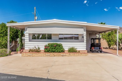 This 2 bedroom/2bath mobile home is immaculate and incredibly on Tucson Estates Golf Course in Arizona - for sale on GolfHomes.com, golf home, golf lot