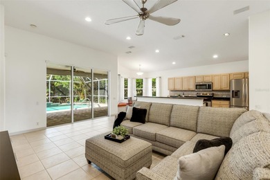 POOLSIDE PARADISE IN RIVER CLUB! Enjoy maintenance-free living on The River Club in Florida - for sale on GolfHomes.com, golf home, golf lot