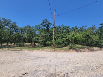 JUST ADDED!! 2 MORE LOTS MAKING THIS PROPERTY 1.5 ACRES! LOCATED on Nocona Hills Golf Course in Texas - for sale on GolfHomes.com, golf home, golf lot