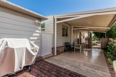 This 2 bedroom/2bath mobile home is immaculate and incredibly on Tucson Estates Golf Course in Arizona - for sale on GolfHomes.com, golf home, golf lot