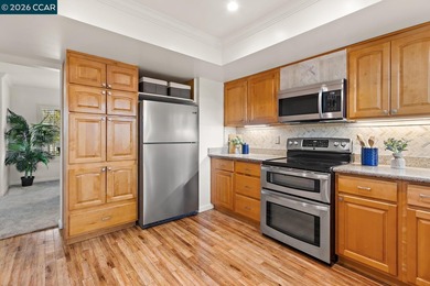 Beautiful updated upper-level Sierra condo. Bright and spacious on Rossmoor Golf Course in California - for sale on GolfHomes.com, golf home, golf lot