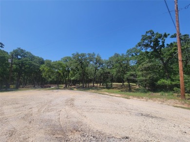 JUST ADDED!! 2 MORE LOTS MAKING THIS PROPERTY 1.5 ACRES! LOCATED on Nocona Hills Golf Course in Texas - for sale on GolfHomes.com, golf home, golf lot