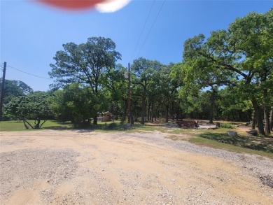 JUST ADDED!! 2 MORE LOTS MAKING THIS PROPERTY 1.5 ACRES! LOCATED on Nocona Hills Golf Course in Texas - for sale on GolfHomes.com, golf home, golf lot