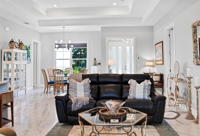 The ultimate saltwater lifestyle awaits in this like-new 2021 on Palm Harbor Golf Club in Florida - for sale on GolfHomes.com, golf home, golf lot
