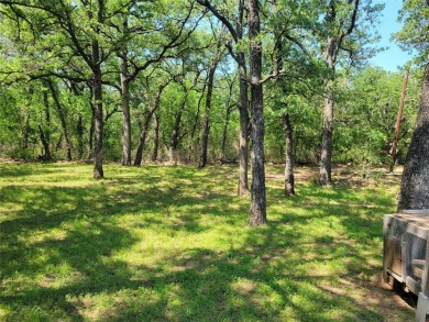 JUST ADDED!! 2 MORE LOTS MAKING THIS PROPERTY 1.5 ACRES! LOCATED on Nocona Hills Golf Course in Texas - for sale on GolfHomes.com, golf home, golf lot