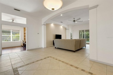 POOLSIDE PARADISE IN RIVER CLUB! Enjoy maintenance-free living on The River Club in Florida - for sale on GolfHomes.com, golf home, golf lot