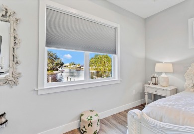 The ultimate saltwater lifestyle awaits in this like-new 2021 on Palm Harbor Golf Club in Florida - for sale on GolfHomes.com, golf home, golf lot