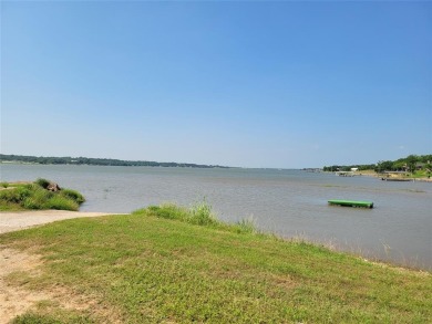 JUST ADDED!! 2 MORE LOTS MAKING THIS PROPERTY 1.5 ACRES! LOCATED on Nocona Hills Golf Course in Texas - for sale on GolfHomes.com, golf home, golf lot