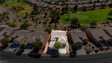 Discover your dream retreat, ideally situated on the 12th on Aliante Golf Club in Nevada - for sale on GolfHomes.com, golf home, golf lot