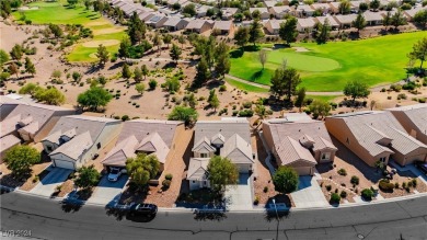 Discover your dream retreat, ideally situated on the 12th on Aliante Golf Club in Nevada - for sale on GolfHomes.com, golf home, golf lot