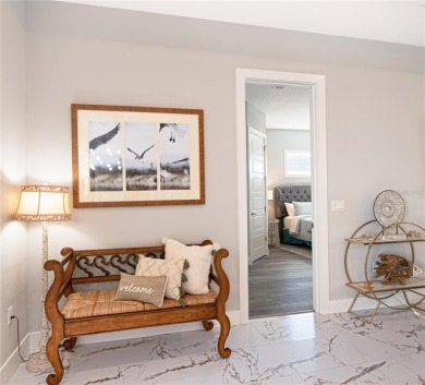The ultimate saltwater lifestyle awaits in this like-new 2021 on Palm Harbor Golf Club in Florida - for sale on GolfHomes.com, golf home, golf lot