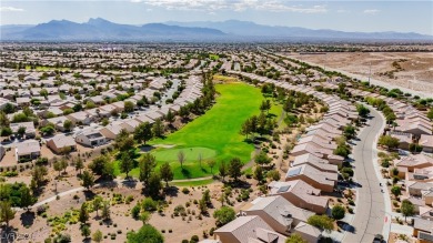 Discover your dream retreat, ideally situated on the 12th on Aliante Golf Club in Nevada - for sale on GolfHomes.com, golf home, golf lot