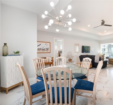 The ultimate saltwater lifestyle awaits in this like-new 2021 on Palm Harbor Golf Club in Florida - for sale on GolfHomes.com, golf home, golf lot