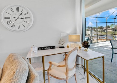 The ultimate saltwater lifestyle awaits in this like-new 2021 on Palm Harbor Golf Club in Florida - for sale on GolfHomes.com, golf home, golf lot