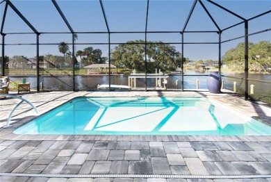 The ultimate saltwater lifestyle awaits in this like-new 2021 on Palm Harbor Golf Club in Florida - for sale on GolfHomes.com, golf home, golf lot