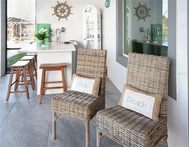 The ultimate saltwater lifestyle awaits in this like-new 2021 on Palm Harbor Golf Club in Florida - for sale on GolfHomes.com, golf home, golf lot