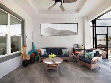 The ultimate saltwater lifestyle awaits in this like-new 2021 on Palm Harbor Golf Club in Florida - for sale on GolfHomes.com, golf home, golf lot