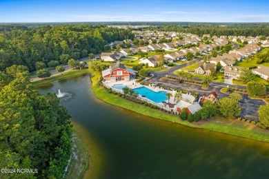 Start living your best life at the coast! This low-maintenance on Crow Creek Golf Club in North Carolina - for sale on GolfHomes.com, golf home, golf lot