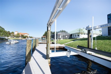 The ultimate saltwater lifestyle awaits in this like-new 2021 on Palm Harbor Golf Club in Florida - for sale on GolfHomes.com, golf home, golf lot