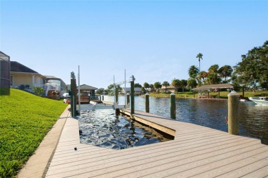 The ultimate saltwater lifestyle awaits in this like-new 2021 on Palm Harbor Golf Club in Florida - for sale on GolfHomes.com, golf home, golf lot