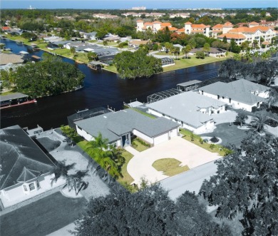 The ultimate saltwater lifestyle awaits in this like-new 2021 on Palm Harbor Golf Club in Florida - for sale on GolfHomes.com, golf home, golf lot