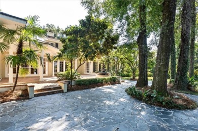 Situated on two lots with nearly an acre of land in one of the on Country Club of Mobile in Alabama - for sale on GolfHomes.com, golf home, golf lot