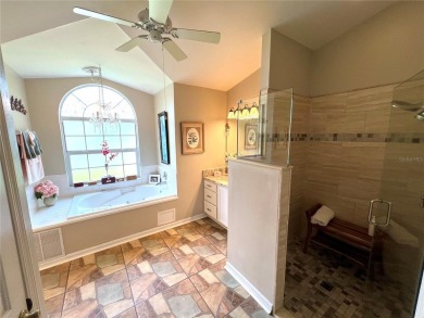 Beautiful home with a large Florida room overlooking a golf on Plantation Golf Club in Florida - for sale on GolfHomes.com, golf home, golf lot