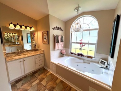 Beautiful home with a large Florida room overlooking a golf on Plantation Golf Club in Florida - for sale on GolfHomes.com, golf home, golf lot