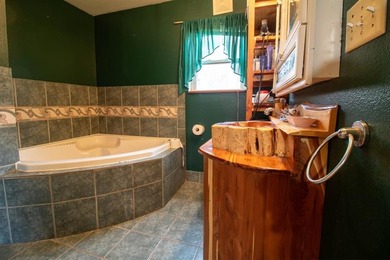 Tucked away on almost four acres in a heavily treed, park-like on Kings Creek Golf Club in Texas - for sale on GolfHomes.com, golf home, golf lot