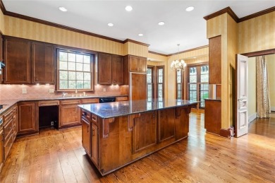 Situated on two lots with nearly an acre of land in one of the on Country Club of Mobile in Alabama - for sale on GolfHomes.com, golf home, golf lot
