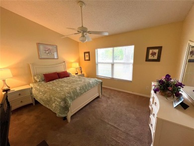 Beautiful home with a large Florida room overlooking a golf on Plantation Golf Club in Florida - for sale on GolfHomes.com, golf home, golf lot