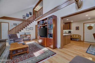 Meticulously maintained log-sided lakefront on TinkWig Lake with on Woodloch Springs Country Club in Pennsylvania - for sale on GolfHomes.com, golf home, golf lot