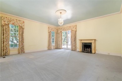 Situated on two lots with nearly an acre of land in one of the on Country Club of Mobile in Alabama - for sale on GolfHomes.com, golf home, golf lot