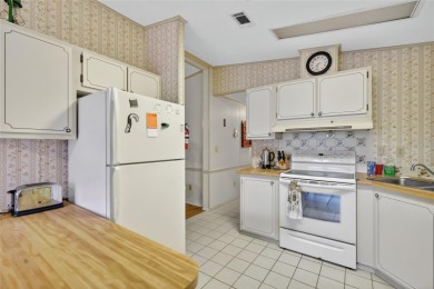 Come take a look at this well maintained home in The Villages at on Silver Lake Executive Golf Course in Florida - for sale on GolfHomes.com, golf home, golf lot