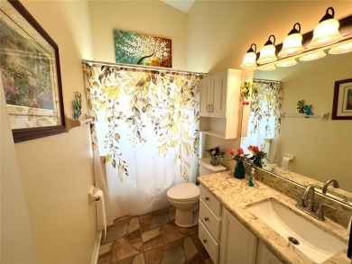 Beautiful home with a large Florida room overlooking a golf on Plantation Golf Club in Florida - for sale on GolfHomes.com, golf home, golf lot