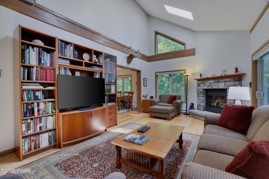 Meticulously maintained log-sided lakefront on TinkWig Lake with on Woodloch Springs Country Club in Pennsylvania - for sale on GolfHomes.com, golf home, golf lot