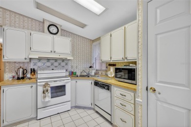 Come take a look at this well maintained home in The Villages at on Silver Lake Executive Golf Course in Florida - for sale on GolfHomes.com, golf home, golf lot