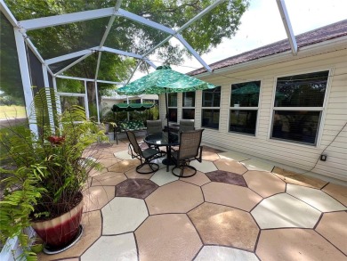 Beautiful home with a large Florida room overlooking a golf on Plantation Golf Club in Florida - for sale on GolfHomes.com, golf home, golf lot