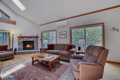 Meticulously maintained log-sided lakefront on TinkWig Lake with on Woodloch Springs Country Club in Pennsylvania - for sale on GolfHomes.com, golf home, golf lot