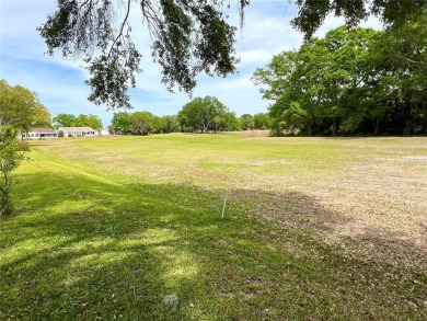 Beautiful home with a large Florida room overlooking a golf on Plantation Golf Club in Florida - for sale on GolfHomes.com, golf home, golf lot