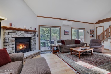 Meticulously maintained log-sided lakefront on TinkWig Lake with on Woodloch Springs Country Club in Pennsylvania - for sale on GolfHomes.com, golf home, golf lot